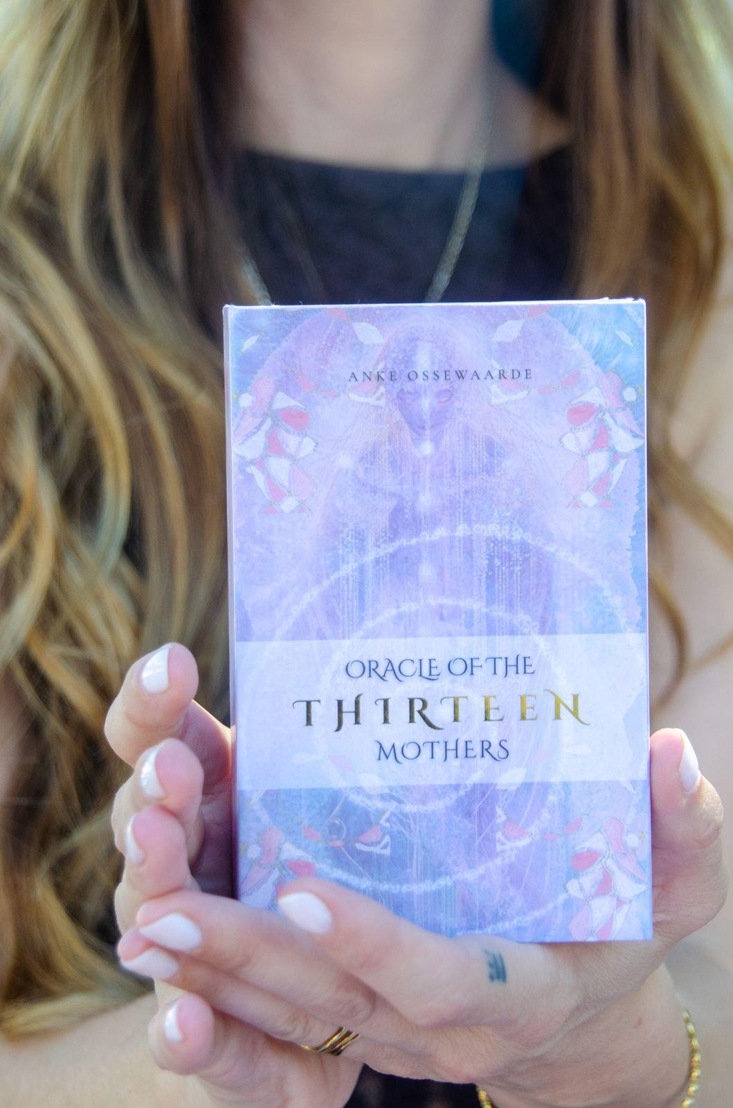 Anke holding the Oracle of the Thirteen Mothers in both hands