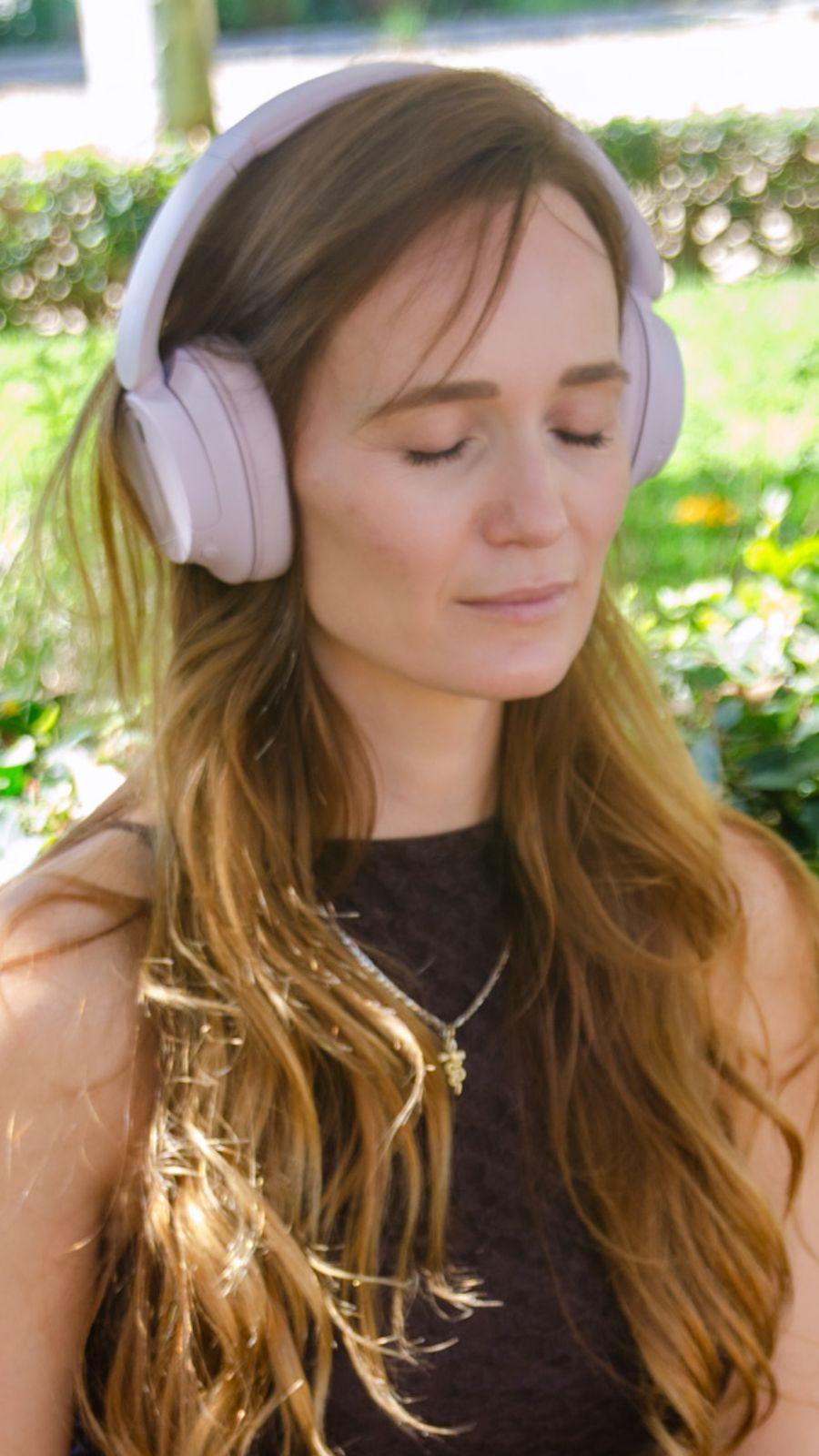 Anke meditating with headphones